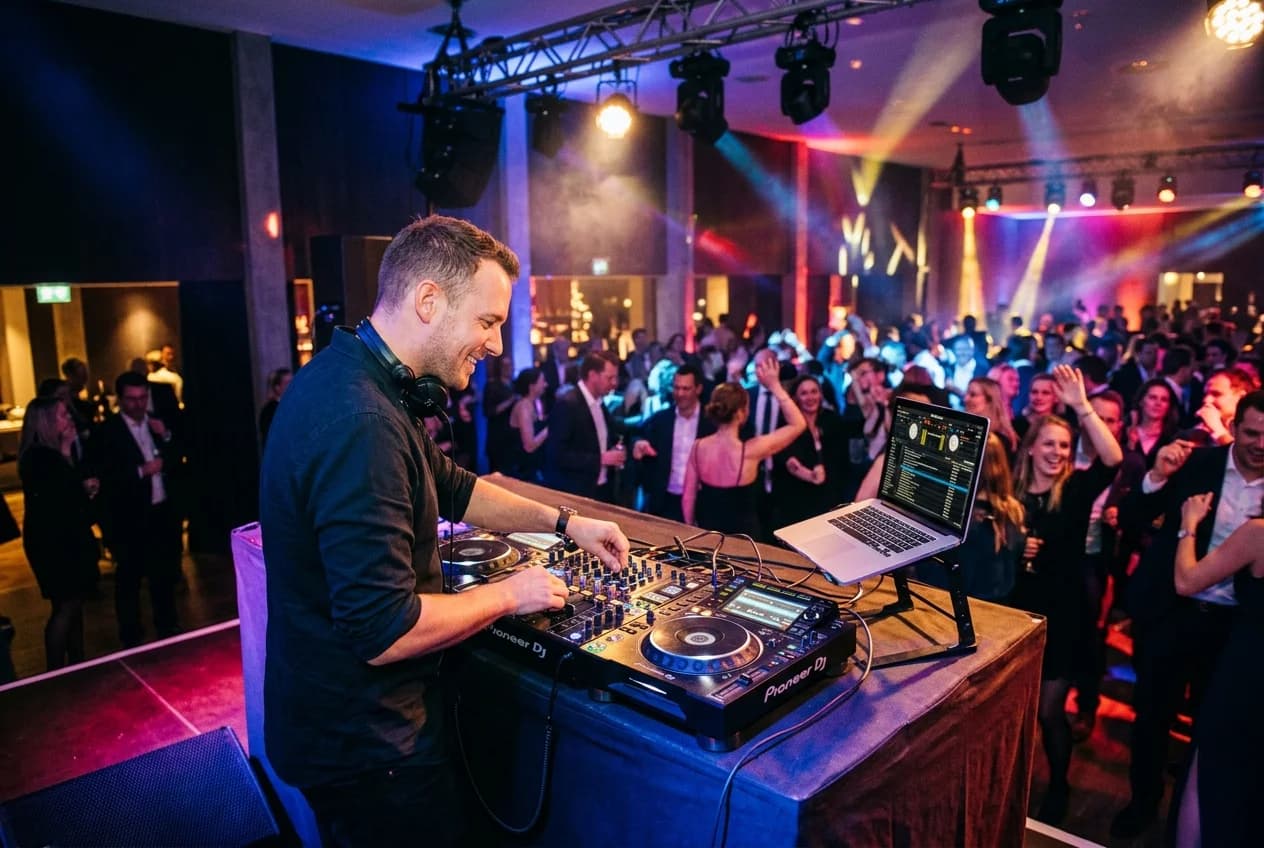 DJ performing at a corporate event in Zurich with professional sound and lighting